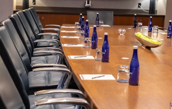 Boardroom with long table and chairs