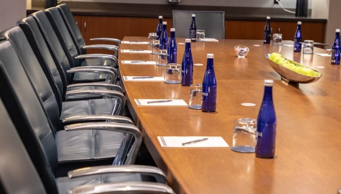 Boardroom with long table and chairs