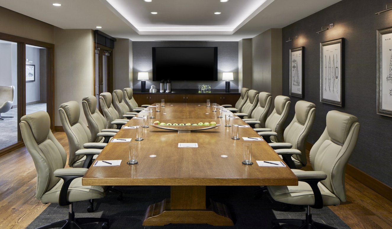 Boardroom with long table and chairs