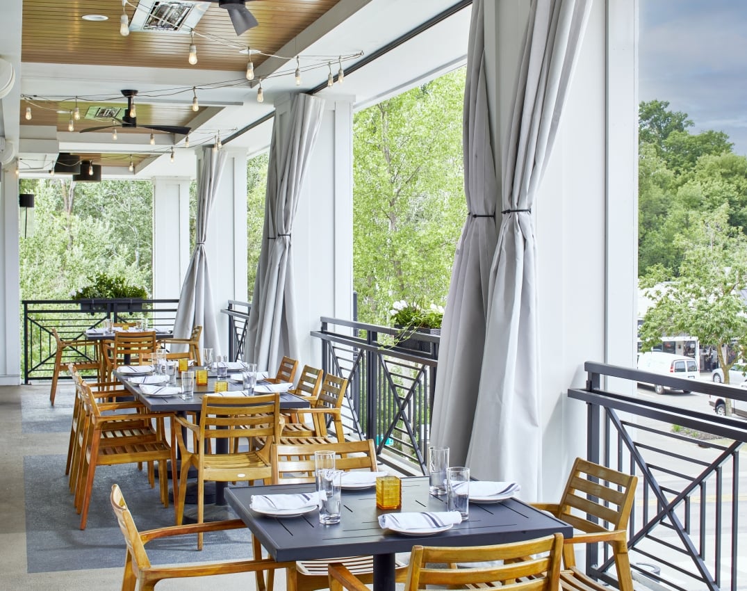 Mezzanine-Level Porches for Outdoor Dining and Private Events