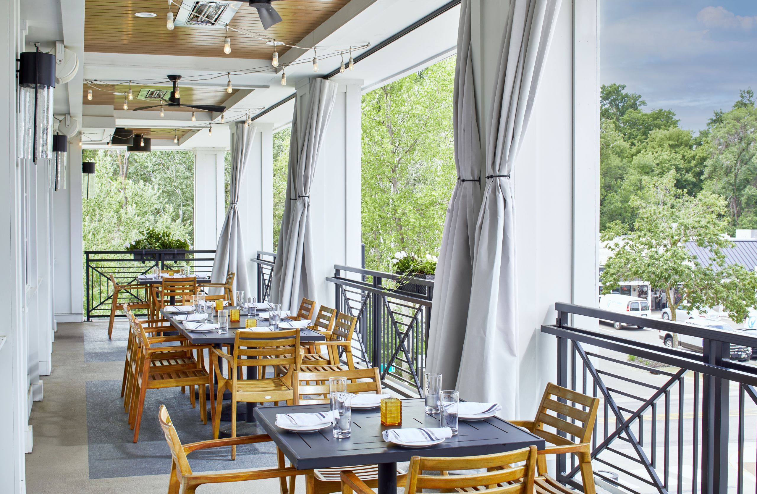 Mezzanine-Level Porches for Outdoor Dining and Private Events