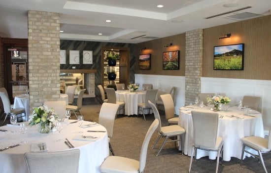 Fireside room with tables and chair for events