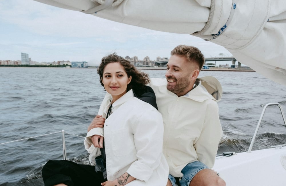 couple on a boat on the lake