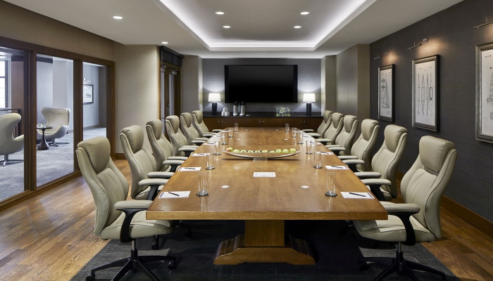 Boardroom with long table and chairs