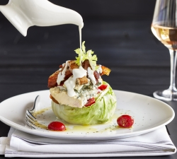 Wedge salad with glass of rose