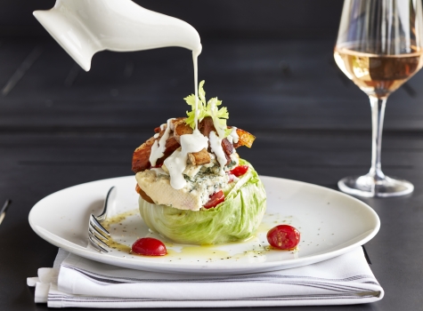 Wedge salad with glass of rose