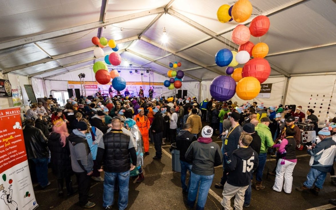 a group of people at a chili tasting competition