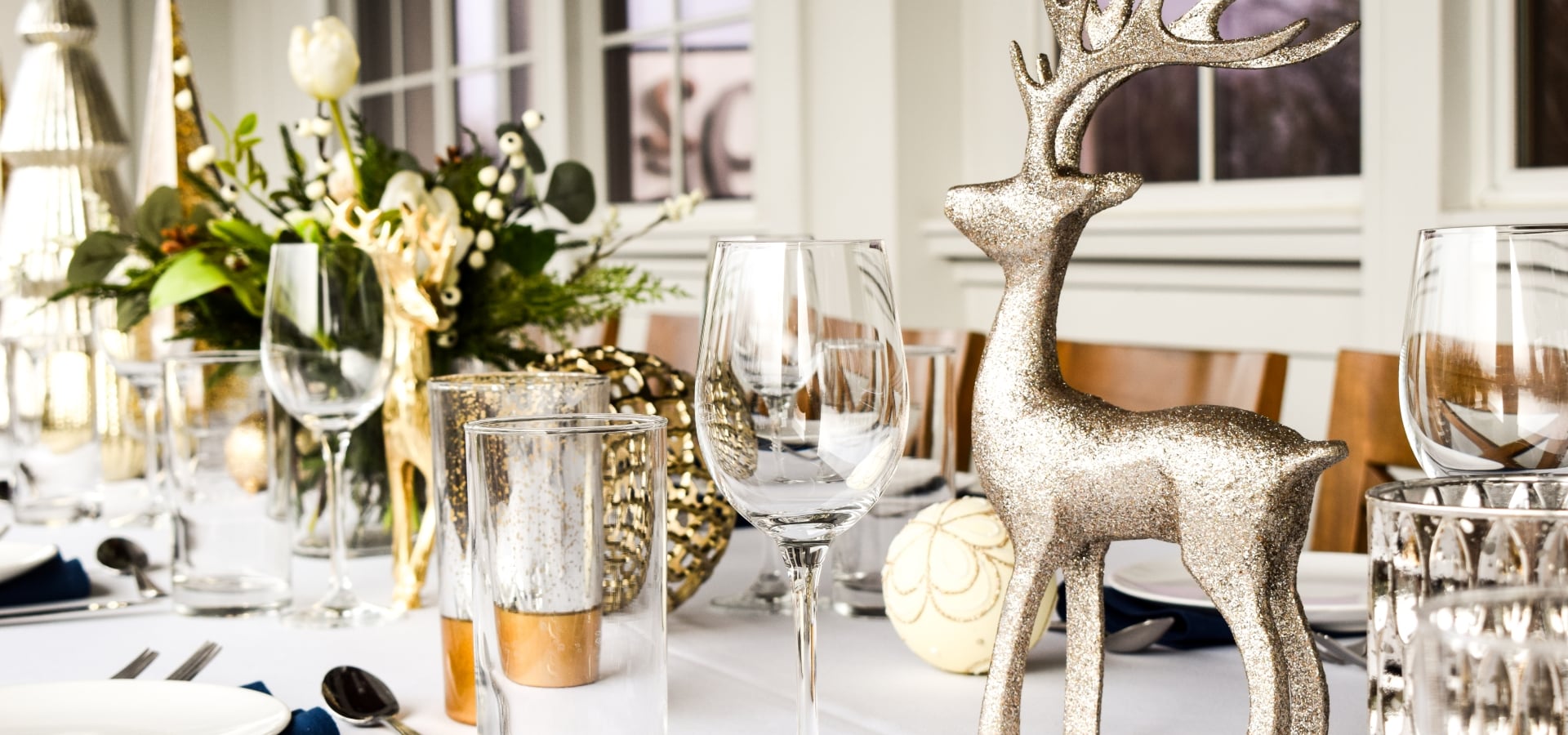 dining table with holiday decor set on it