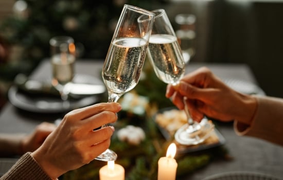 A couple having a cheers at a dinner table