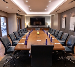 Boardroom with long table and chairs