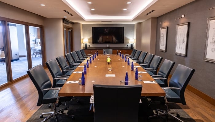 Boardroom with long table and chairs