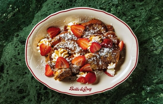 French Toast with strawberries and whip cream at Belle and Grey